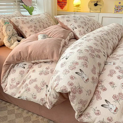 Pastel pink and cream floral bunny quilt cover set made of soft cotton for a floral cream and peach bedroom