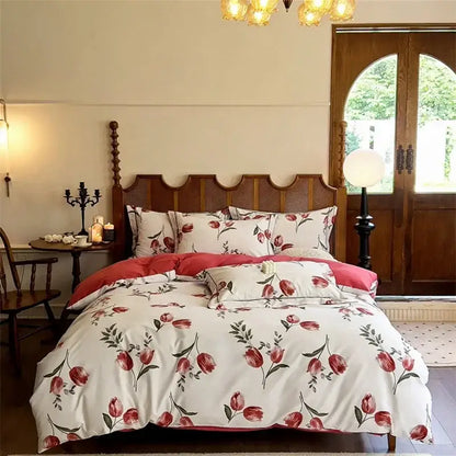 White duvet cover with red tulip pattern and pink pillowcases in floral cream egyptian cotton bedding sets