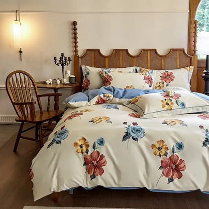Cream-colored floral egyptian cotton bedding set featuring vibrant red blue and yellow blossoms on soft fabric