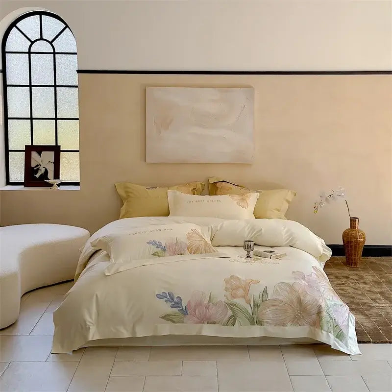 Cream-colored satin bed linens with delicate pink lavender and green floral patterns made from decorbites 100s egyptian cotton