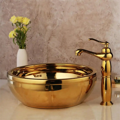 Floral embossed decorbites golden ceramic glossy vessel sink with matching brass mixer faucet bathroom set