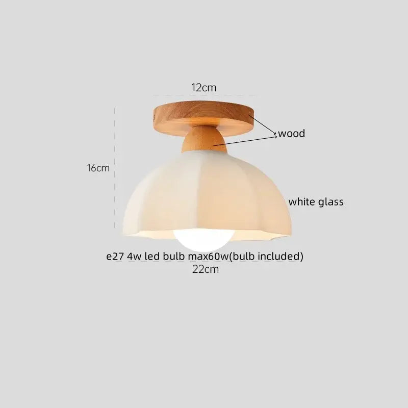 Minimalist led ceiling lamp with a warm wooden base and floral etched white glass dome for living room use