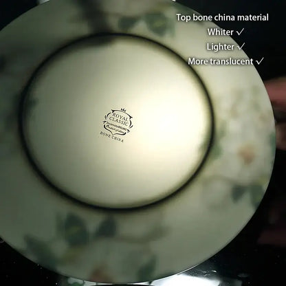 A delicate royal classic bone china fruit plates set with floral pattern and glossy translucent white finish