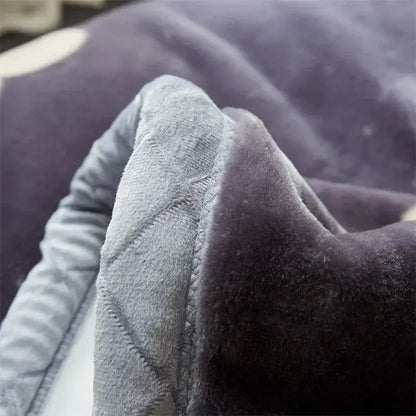 A dark gray plush cozy flocked raschel blanket with soft texture and visible stitching for bedroom bedding decorbites cozy flocked