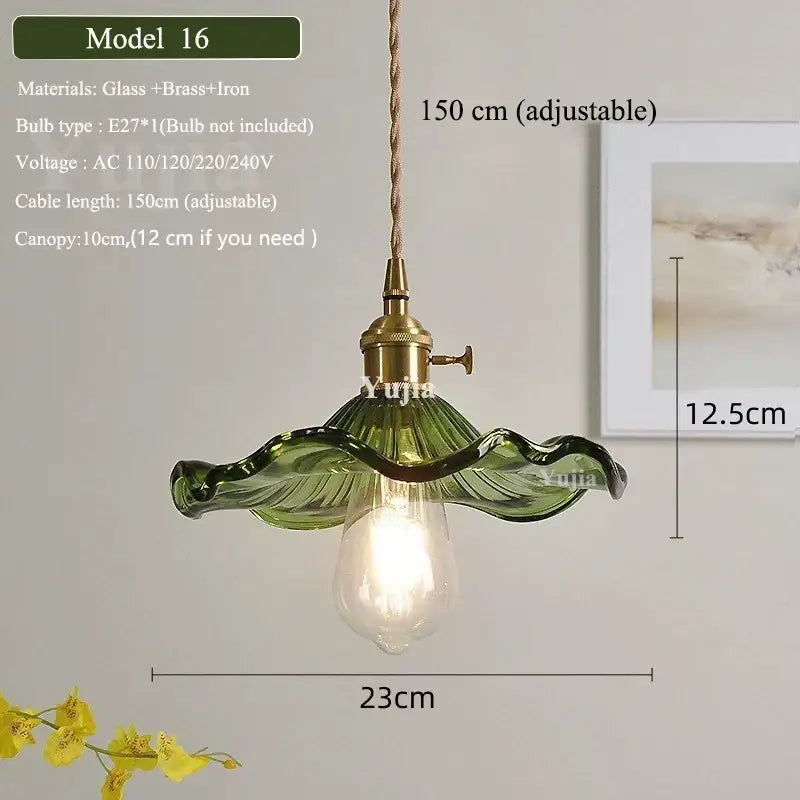 Floral green glass pendant light with brass-finished metal fixture and adjustable cord green glass shade for kitchen