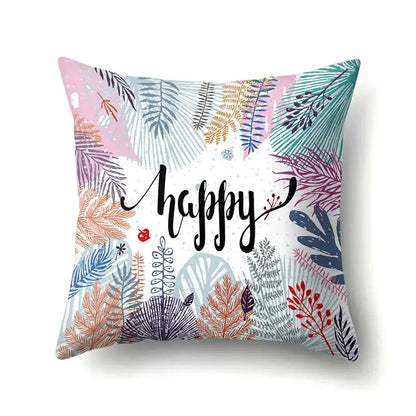 Colorful pillow cover with decorbites green tropical leaves and happy script for vibrant bedroom decor
