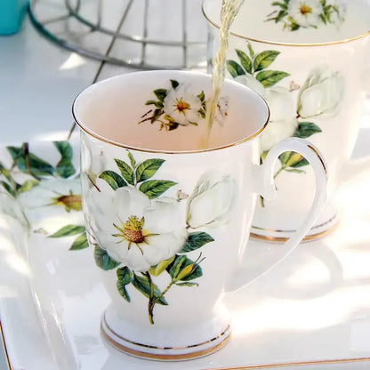 White porcelain teacup with white rose floral design and gold trim from decorbites bone china tea set dining room pitcher