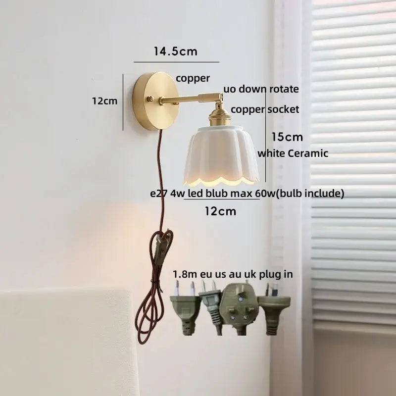 Copper finished wall light fixture with white ceramic shade and gold pull chain for bedroom use
