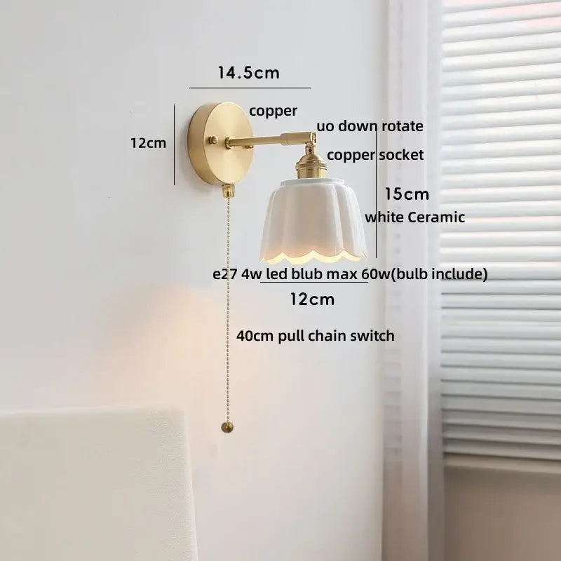 Vintage-style wall light fixture with copper metal arm and scalloped white ceramic shade for bedroom use