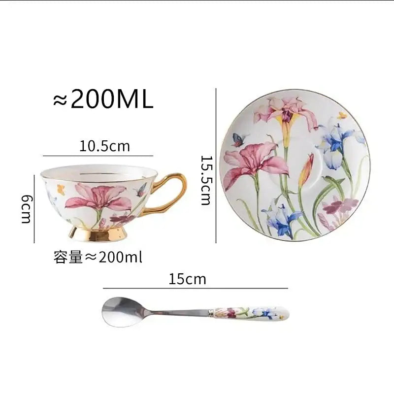 A delicate porcelain lily flower tea set with hand-painted pink and blue irises, butterflies, and gold-trimmed rims
