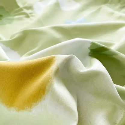 Soft flowing floral mint green cotton duvet cover featuring a gentle gradient and vibrant yellow accent for bedding decorbites cotton duvet