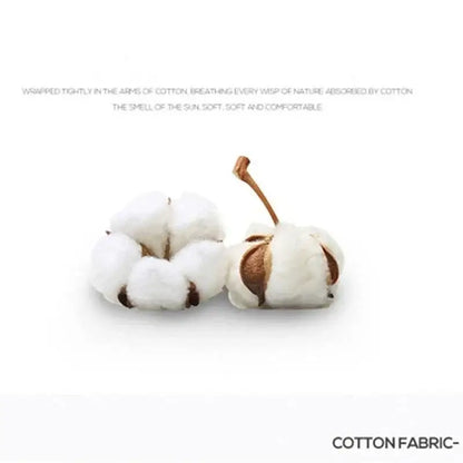 Two fluffy white cotton bolls with brown stems highlighting natural fiber texture for floral mint green cotton duvet cover decorbites