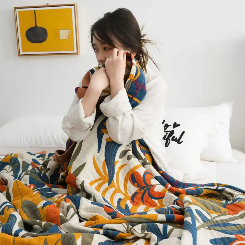 Cozy quilted floral cotton summer throw blanket in orange blue and green on cream for bedroom decorbites cotton summer