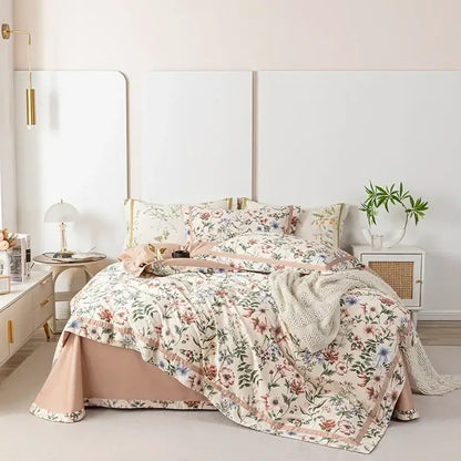 Floral pastel 100s Egyptian cotton bedding set with blush pink trim and delicate botanical designs on cream fabric