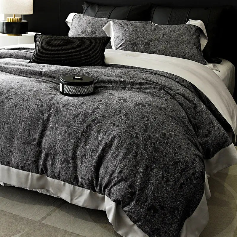 Black and gray damask-patterned duvet set with white satin trim in floral pastel cream lyocell cotton bedding set
