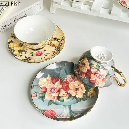 Elegant porcelain coffee cup and saucer set with gold trim and soft pink yellow green decorbites flowers pattern