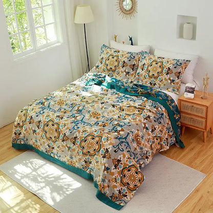 Beige and teal floral quilt with embroidered patterns on decorbites cotton gauze towel blanket for bedroom use