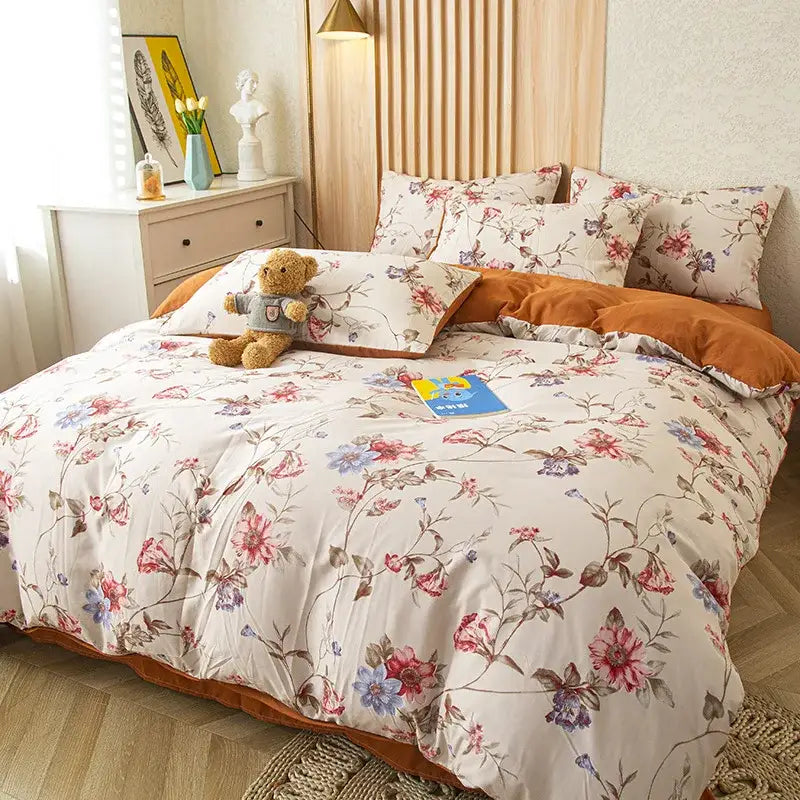 Floral pink and blue flower print bedding set with cream base on soft cotton fabric for bedroom use