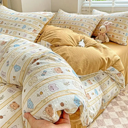 Cute beige and blue cartoon bear patterned cotton bed set with striped design in floral pink and cream cotton flower printed comforter set