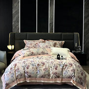 Floral pink egyptian cotton bedding set featuring a satin duvet cover with peach piping and rose blossom pattern