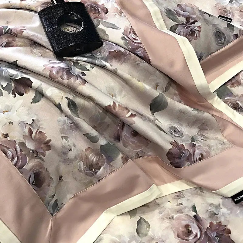 A soft blush pink and cream floral silk scarf with subtle sheen complementing decorbites 100s egyptian cotton bedding set