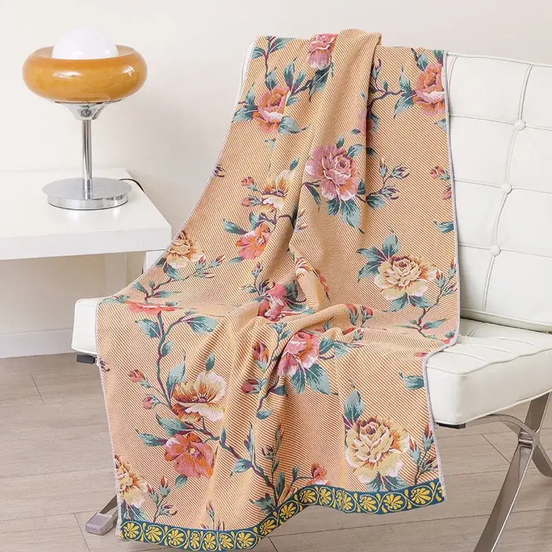 Beige floral pink and yellow cotton gauze bath towel with roses and green leaves for bathroom decor by decorbites cotton gauze