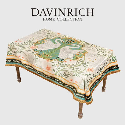 Elegant cream-colored floral print velvet tablecloth with botanical and swan motif tassels for dining room decor
