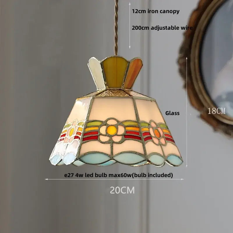 Colorful floral pendant lamp with crown diamond glass panels in red amber cream and blue set in ornate metal frame for dining room decorbites crown diamond