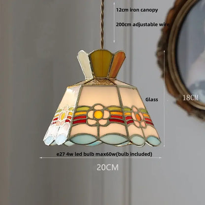 Colorful floral pendant lamp with crown diamond glass panels in red amber cream and blue set in ornate metal frame for dining room decorbites crown diamond