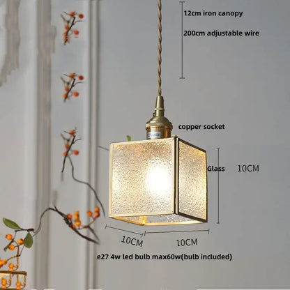 A square glass pendant lamp with brass frame and frosted panels for dining room decorbites crown diamond style