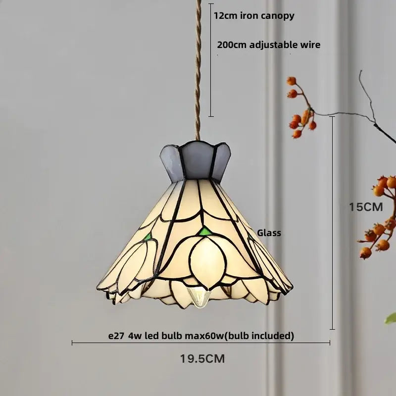 Cream-colored floral stained glass pendant lamp with iron canopy and adjustable wire suspension for dining decorbites crown diamond