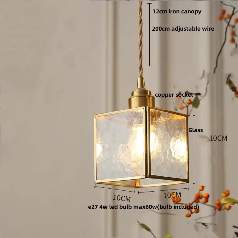 Floral red and amber glass pendant lamp with brass frame textured glass panels and copper socket for dining room decorbites crown diamond