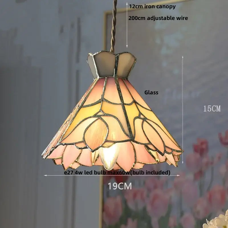 A warm-toned floral red and amber glass pendant lamp with crown diamond glass by decorbites crown diamond