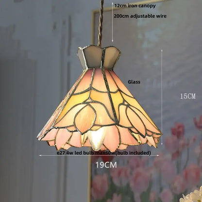 A warm-toned floral red and amber glass pendant lamp with crown diamond glass by decorbites crown diamond