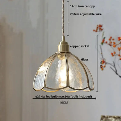 Vintage-style pendant lamp with floral red and amber hammered glass shade brass accents and adjustable copper socket decorbites crown diamond