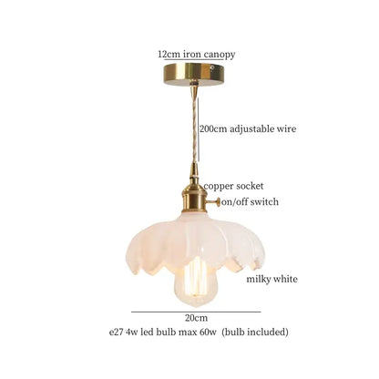 A delicate milky white glass pendant lamp with brass glass led hardware and an adjustable wire for bedroom decorbites use