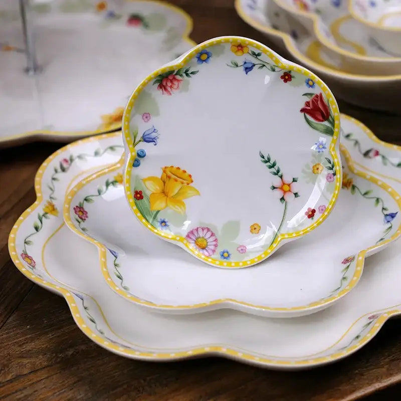 Delicate white porcelain dinnerware set with scalloped edge and vibrant floral patterns for easter tulip dinnerware