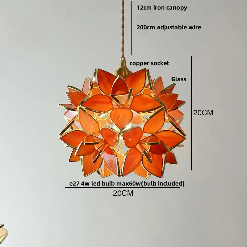 Orangish-orange glass petal pendant light fixture with gold-toned metal frame floral stained glass copper led design