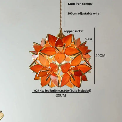 Orangish-orange glass petal pendant light fixture with gold-toned metal frame floral stained glass copper led design