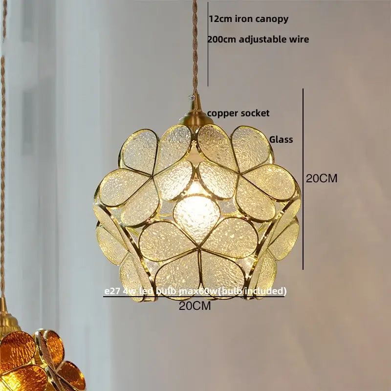 Golden flower-shaped pendant light fixture with textured glass petals and copper socket glass copper led design