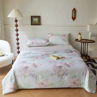 Floral teal and lavender knitted cotton print summer quilt with soft light blue duvet cover and delicate floral design