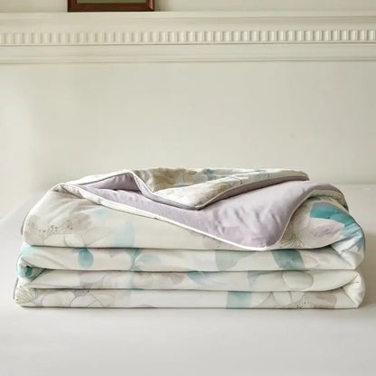 Soft folded floral teal and lavender knitted cotton print summer quilt with plush lining from decorbites knitted cotton