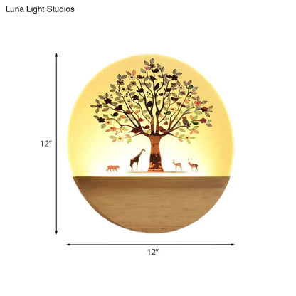 Circular wooden wall light with glowing animal flowering tree and acrylic shade for bedroom night light