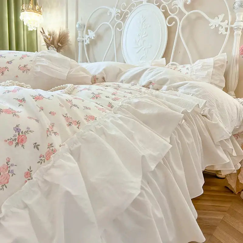 White floral cotton bedding set with pleat lace ruffles and pink purple rose patterns on soft fabric