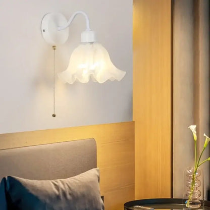 White wall sconce with ruffled floral glass shade and curved iron arm decorbites glass iron led for bedroom decor