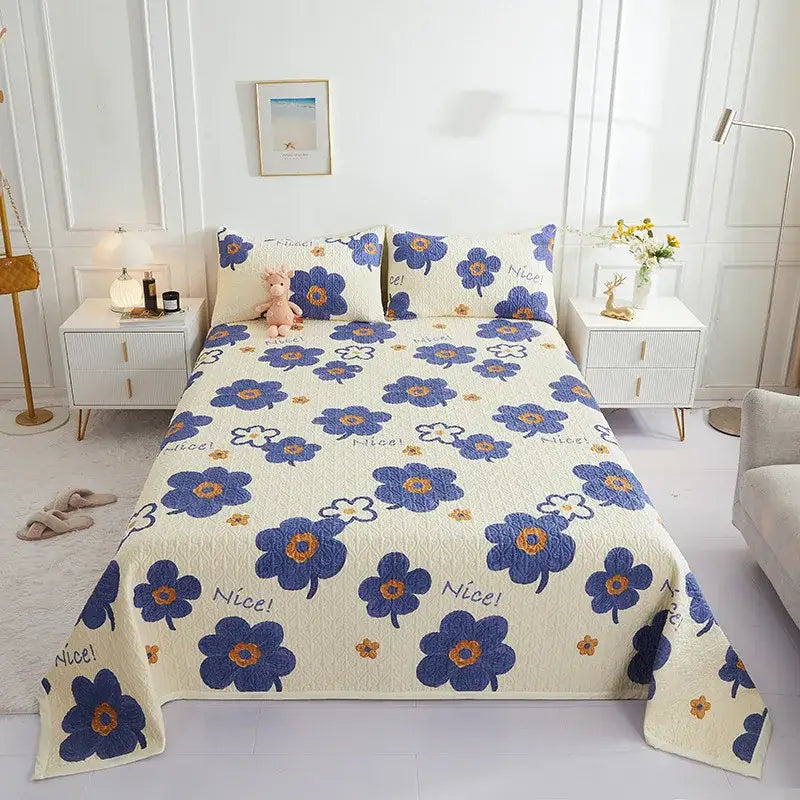 Cream-colored quilted decorbites cotton double bedspread set with embroidered blue and orange flowers and nice text