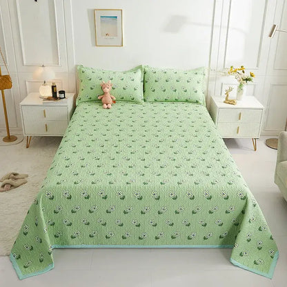 Light green floral patterned cotton double bedspread set with matching pillowcases and light blue border for decorbites decor