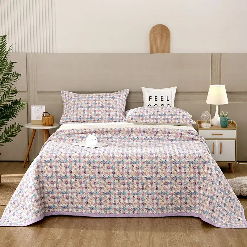 Pastel-colored floral and geometric pastel bedspread set in soft pinks blues and cream decorbites cotton double bedspread