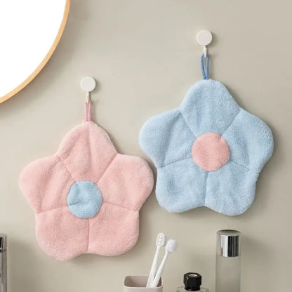 Flower shaped pink and light blue coral fleece hand towels with plush texture and contrasting circular centers for bathroom decorbites coral fleece hand towels