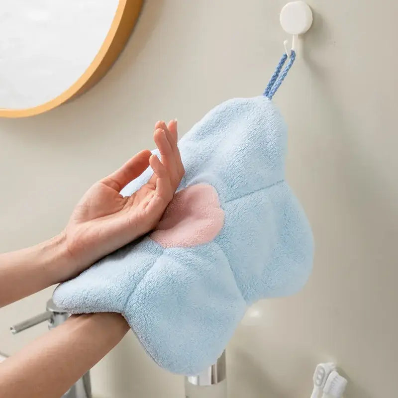 Light blue cloud shaped coral fleece hand towel with pink heart patch and braided loop from decorbites coral fleece collection